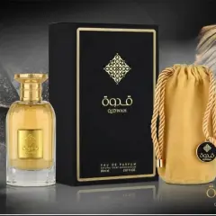 Eleganckie męskie perfumy arabskie Qidwah w złotym flakonie i czarnym pudełku, z dodatkowym, żółtym woreczkiem.